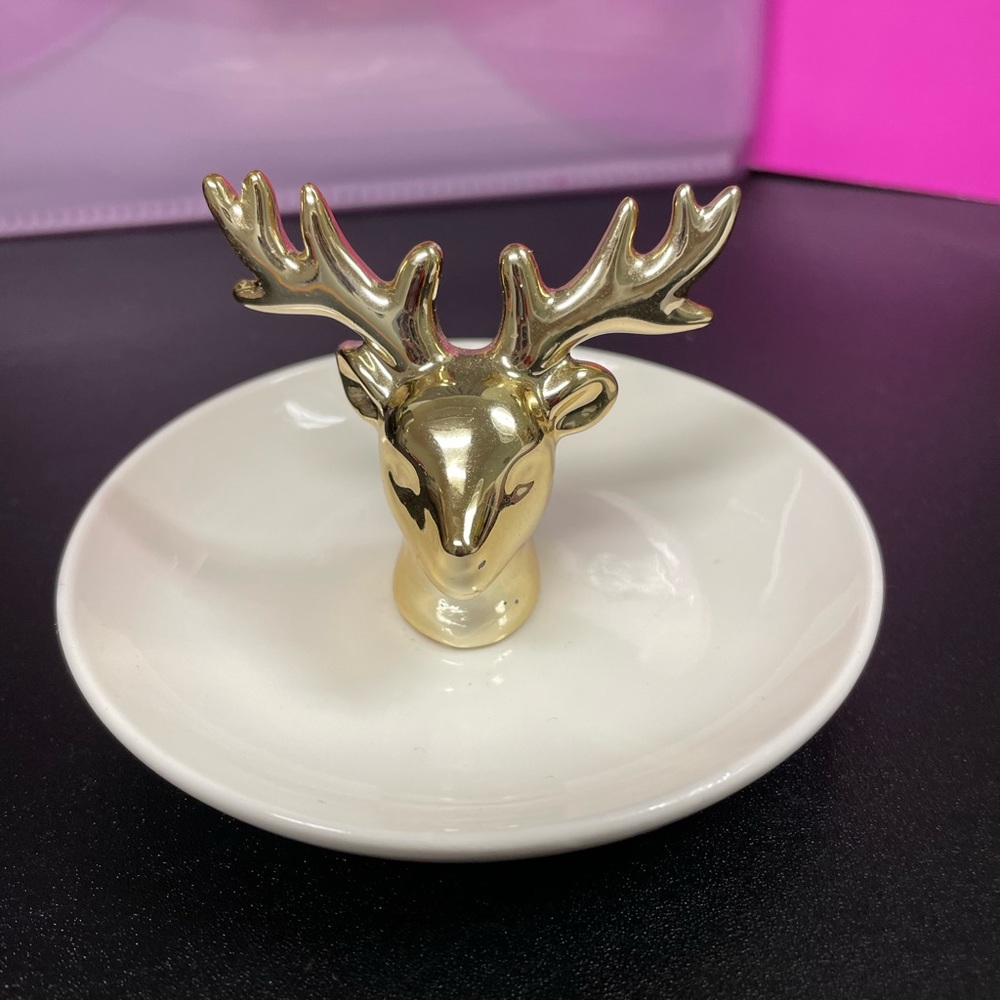 Beautiful golden deer ring holder!